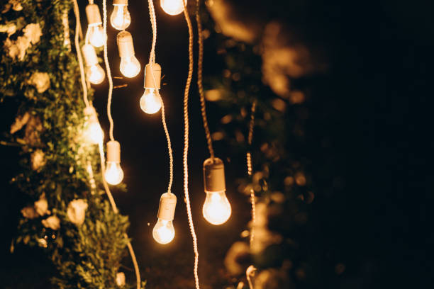 istock wedding decor, decoration of the arch of the exit ceremony with light bulbs 1186145624