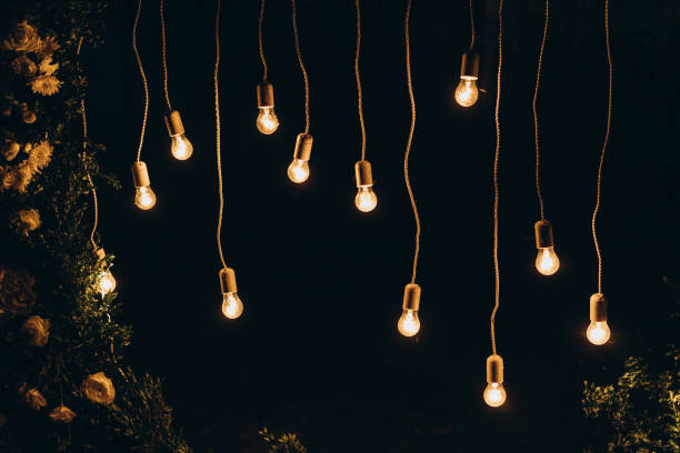istock wedding decor, decoration of the arch of the exit ceremony with light bulbs 1186145711