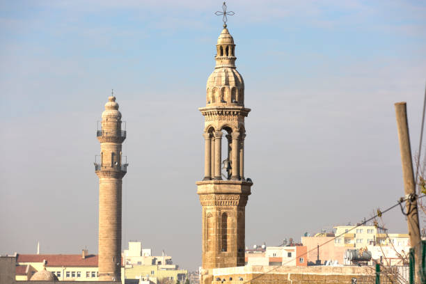 turkey in the province of mardin midyat historic stone house in the town, monasteries, religious sites and symbols. - sao gabriel tower imagens e fotografias de stock