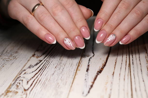 istock French manicure with pearls 1186147207