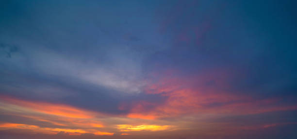 istock Sunset sky. Abstract nature background. Dramatic blue and orange, colorful clouds at twilight time. 1186147574
