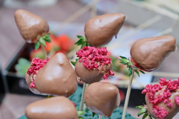 istock A bouquet of chocolate covered strawberries with different toppings 1186148354