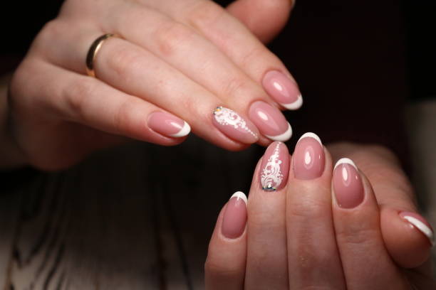 istock beautiful French manicure 1186148829