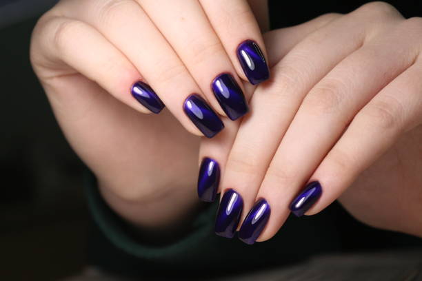 istock stylish design of manicure on long beautiful nails 1186149756
