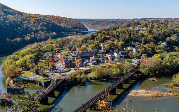 Harpers Ferry National Historic Park in West Virginia Harpers Ferry National Historic Park as seen from Maryland Heights on the banks of the Potomac and Shenandoah Rivers. harpers ferry photos stock pictures, royalty-free photos & images