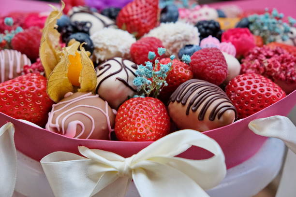 istock A bouquet of chocolate covered strawberries with different toppings 1186150998