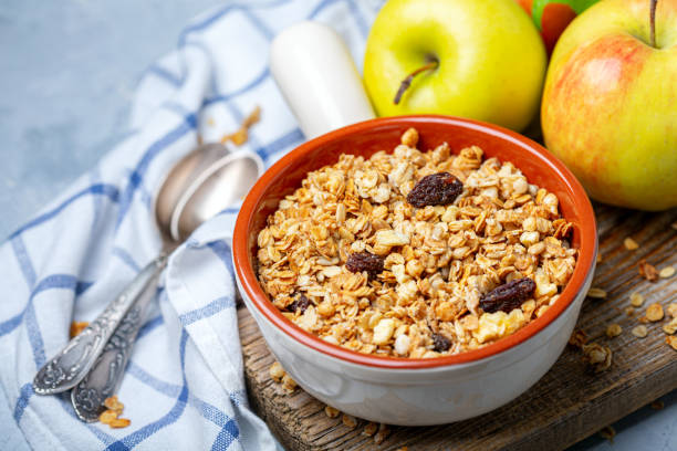 istock Homemade granola with apples and raisins. 1186156798