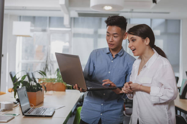 istock Colleagues working at the office together 1186157467