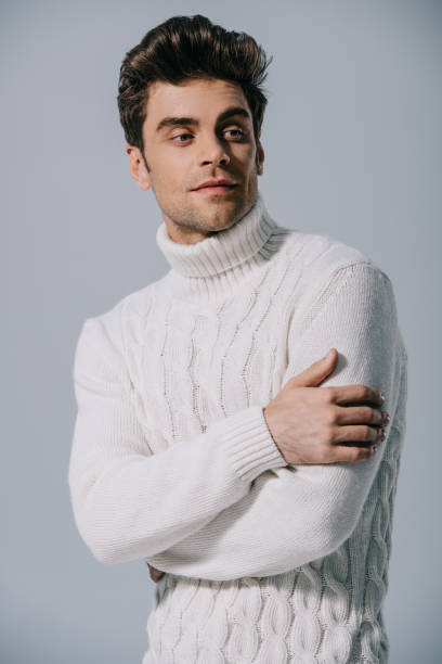 Handsome Man Posing In Knitted Sweater Isolated On Grey Stock Photo -  Download Image Now - iStock