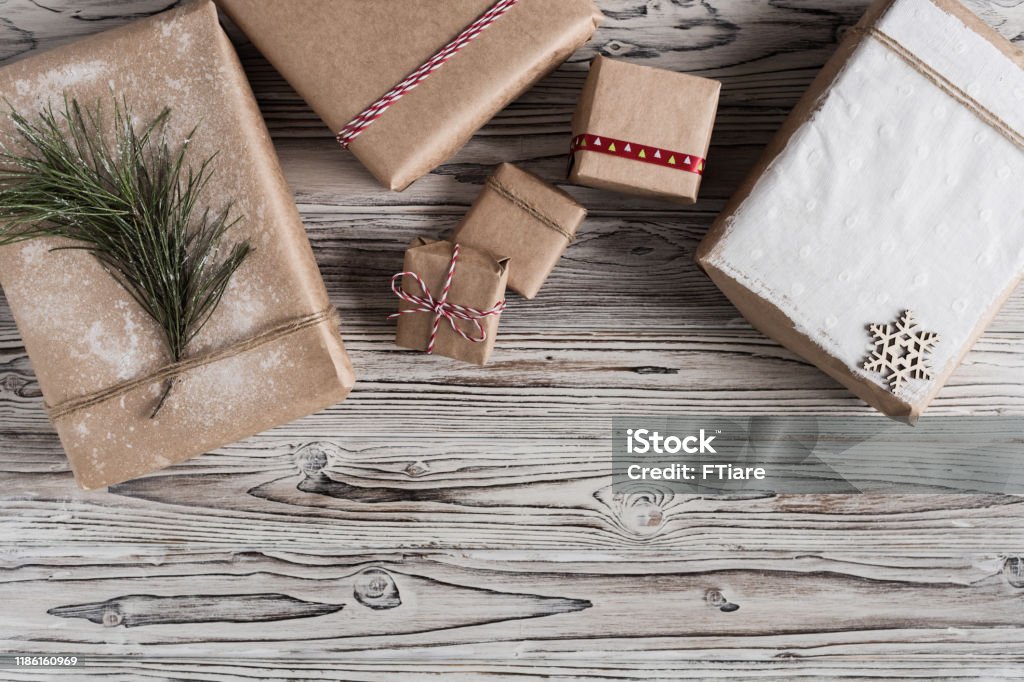 Handmade Gifts Made From Craft Paper Christmas Rope And Tree On The Rustic  Wood Planks Background Diy Stock Photo - Download Image Now - iStock