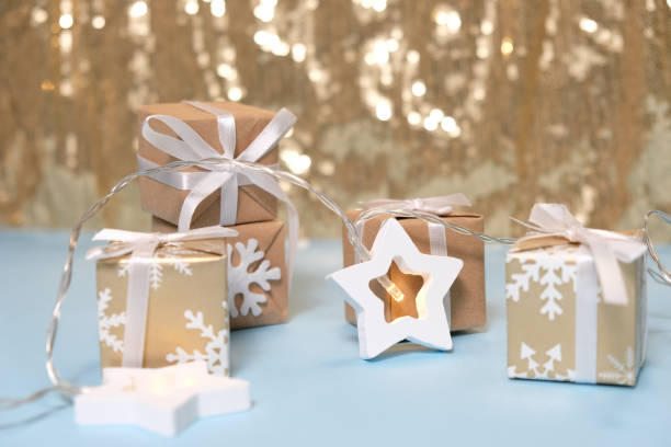 istock Blackground of abstract glitter lights. Gold and white. De focused. 1186161885