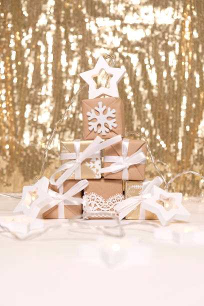 istock Blackground of abstract glitter lights. Gold and white. De focused. 1186161887