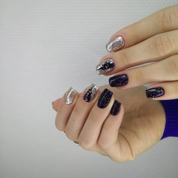 istock beautiful manicure of nails 1186166393