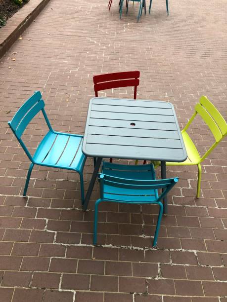 istock Colorful chairs at outdoor table 1186166725