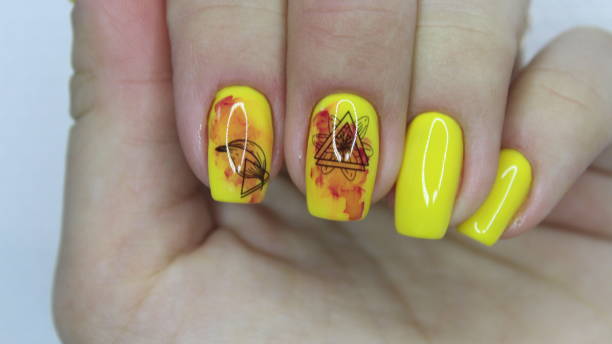 istock Fashionable yellow manicure 1186166873
