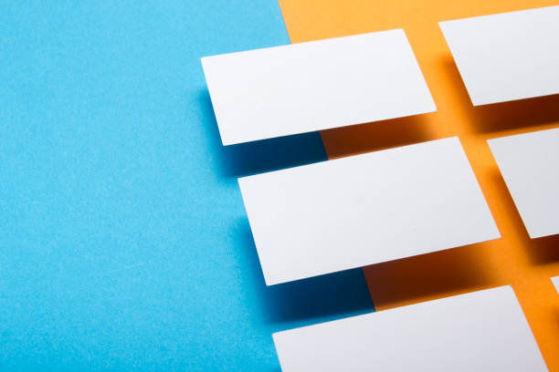 istock Business cards blank. Mockup on color background. Flat Lay. copy space for text 1186169034