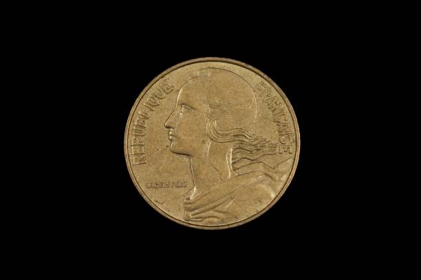 istock An old French franc coin isolated on a black background 1186169362