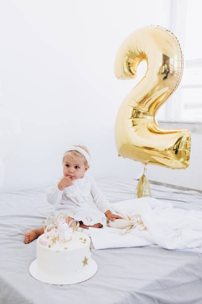 istock The child eats cake with appetite. Birthday baby. 1186169479