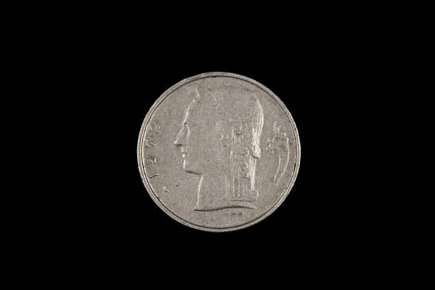 istock An old Belgian franc coin isolated on a black background 1186170249