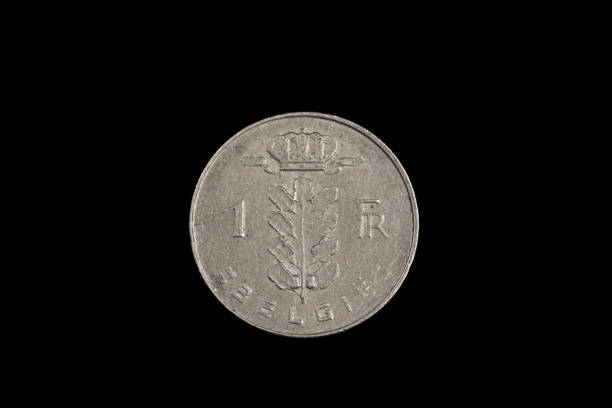 istock An old Belgian franc coin isolated on a black background 1186170261