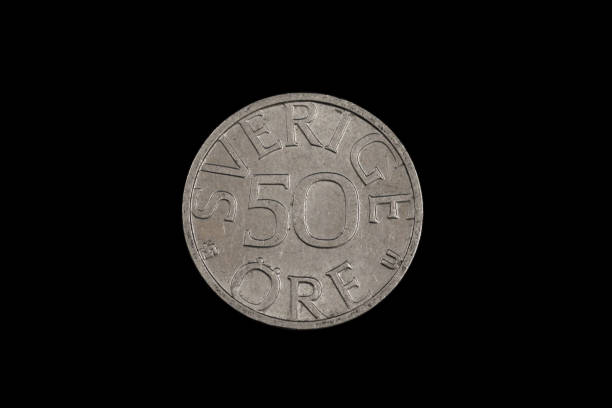 istock An old Swedish ore coin on a black background 1186170330