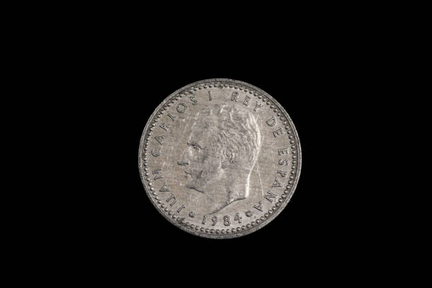 istock An old Spanish one peseta coin on black 1186170454