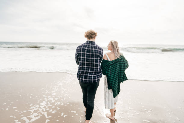 istock Couple on the beach 1186170483