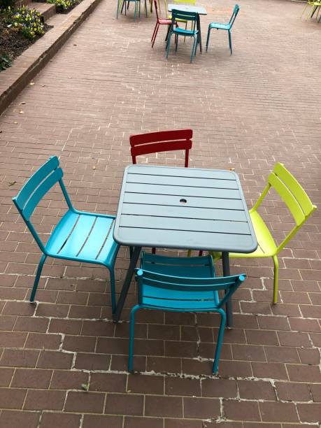 istock Outdoor table with colorful chairs 1186170761