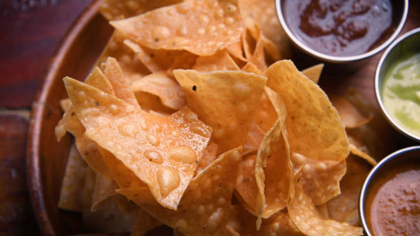 istock Mexican appetizers, Tortilla chips and assorted salsas 1186171559