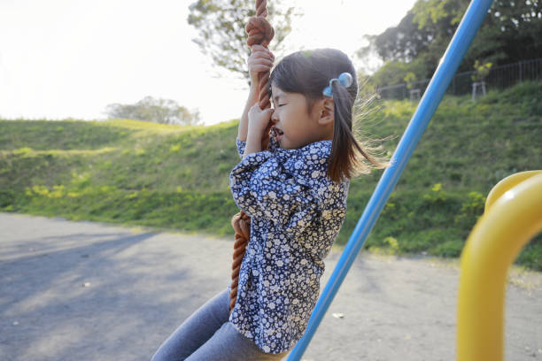 istock Japanese girl (5 years old) playing with flying fox 1186171979
