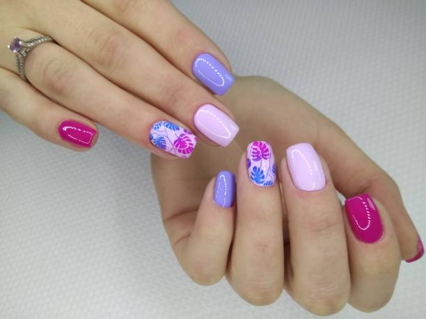 istock fashionable pink nails 1186173126