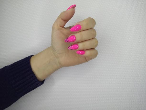 istock fashionable pink nails 1186173415