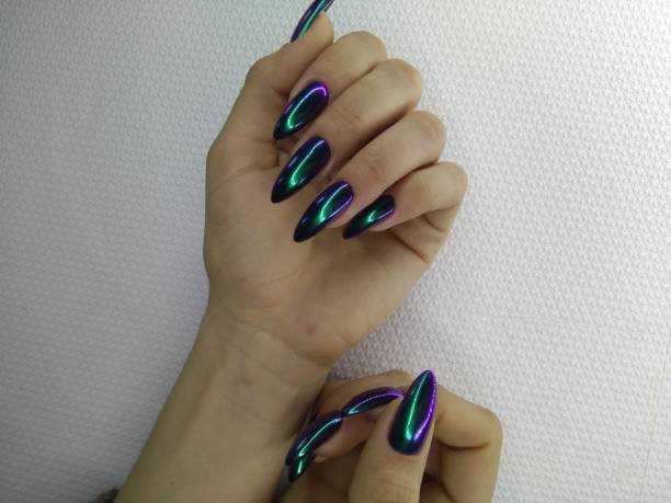 istock beautiful green manicure 1186176109