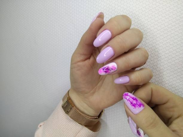 istock fashionable pink nails 1186176969