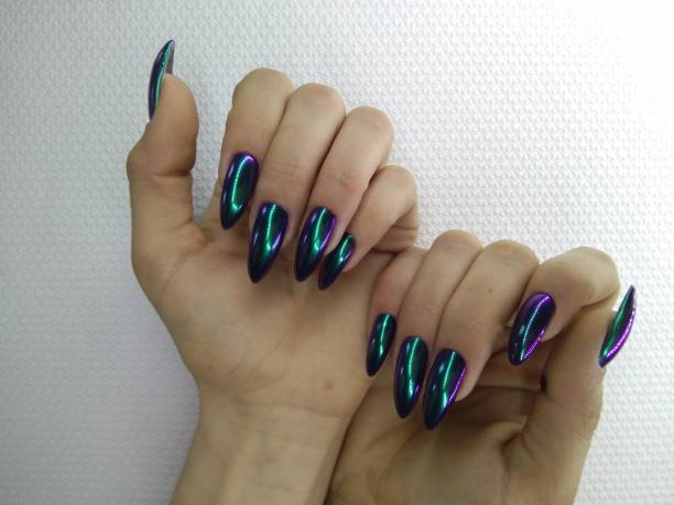 istock beautiful green manicure 1186177027