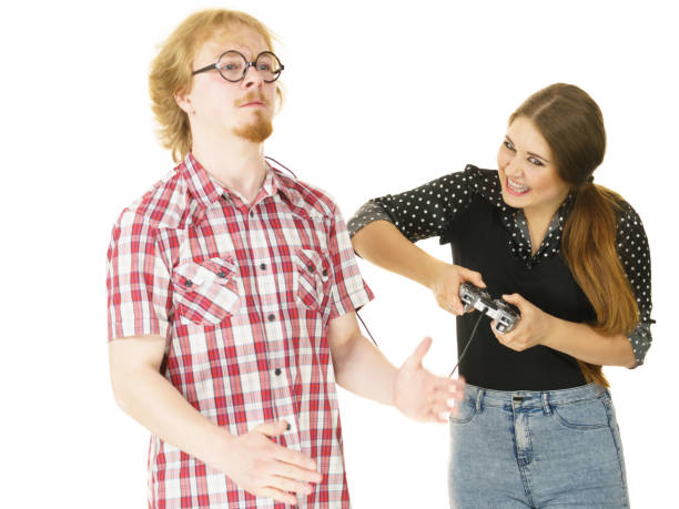 istock Woman controling man using gaming pad 1186178304