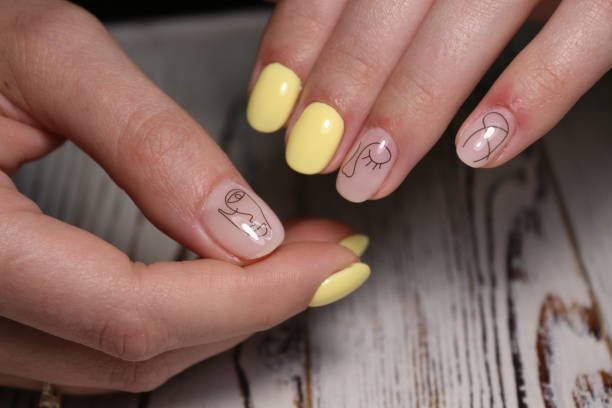 istock Fashionable yellow manicure 1186178443