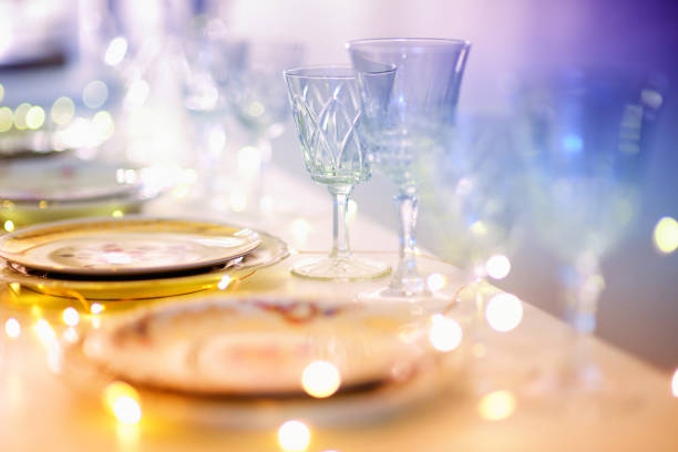 Christmas place setting and festive decor on red table, closeup. Space for text