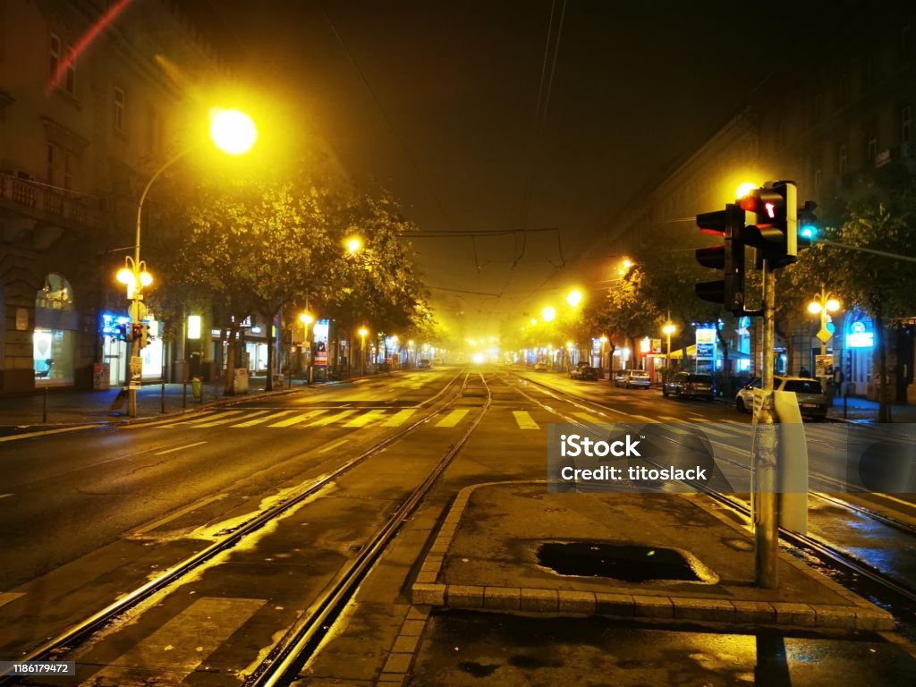Budapest Boulevard and Tramway at Night The main Boulevard at Oktogon at night. The empty night scene is looking down the road and tram tracks towards Nyugati the main train station. Budapest Stock Photo