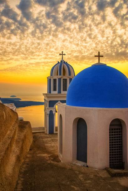 istock Santorini Chapels at Sunset 1186179591