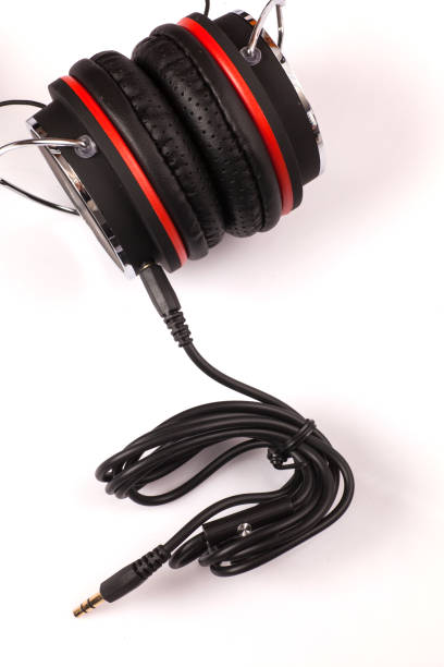 istock headphones or earphone computer isolated on a white background 1186184154