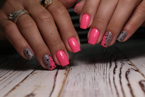 istock glamorous beautiful manicure on a trendy texture 1186184186