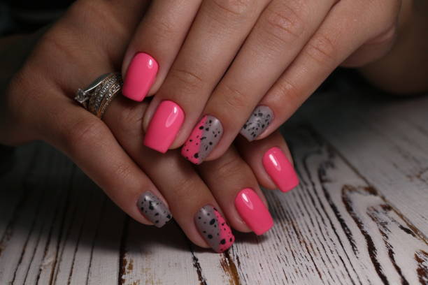 istock glamorous beautiful manicure on a trendy texture 1186184204