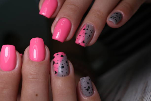 istock fashionable beige manicure with a silver design 1186184220