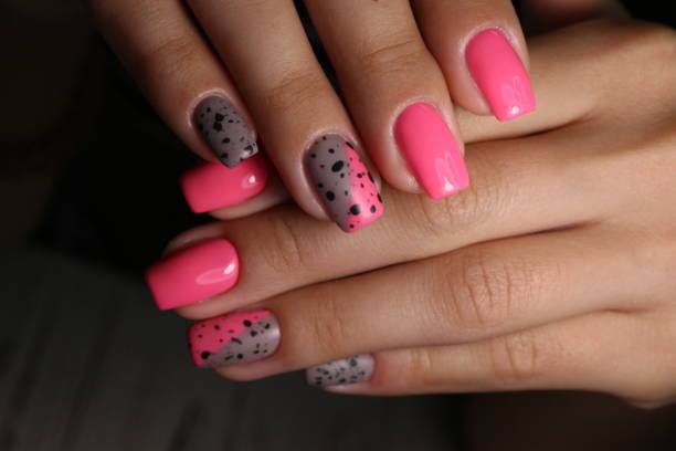 istock fashionable beige manicure with a silver design 1186184966