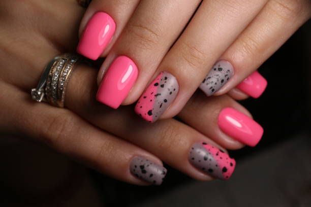 istock stylish design of manicure on beautiful nails 1186184971