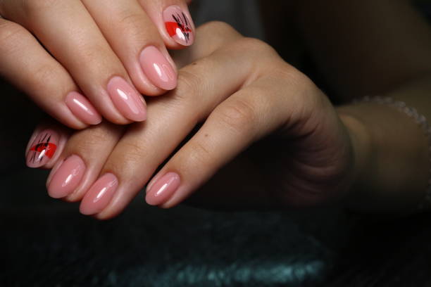 istock Trendy manicure design on a beautiful background. 1186185106