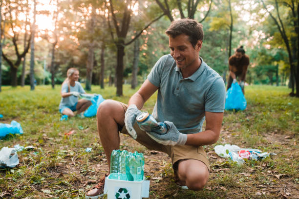 istock Young environmentalist collecting the garbage for recycling 1186187261