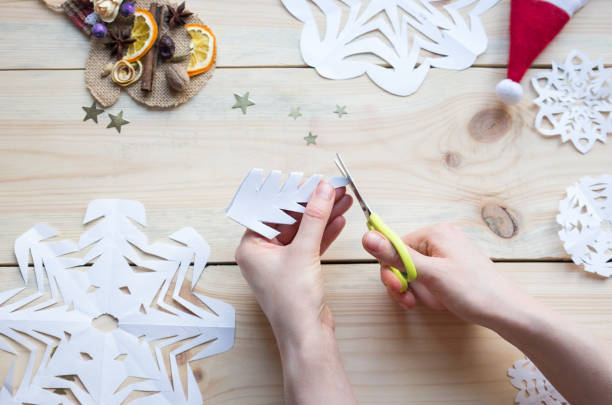 istock snowflakes cut out of paper 1186187421