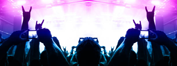istock Filming concert on smart phone 1186187592